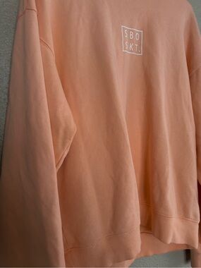 Sabo Skirt Peach Crewneck Sweatshirt with White Logo